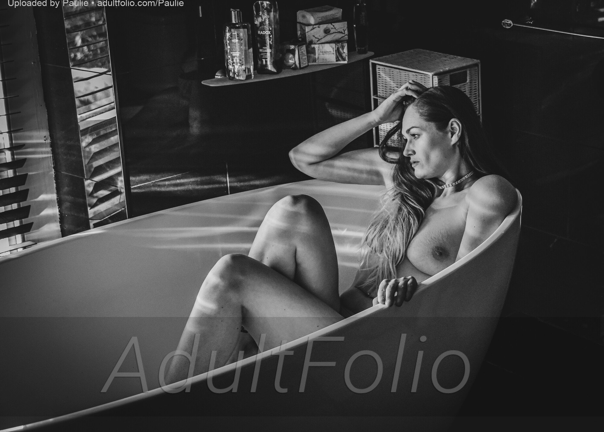 https://www.adultfolio.com/images/watermark/1057[001-999].jpg